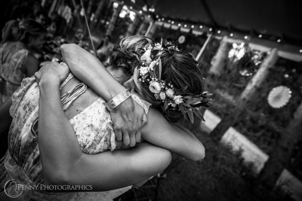 Summer Wedding bride emotional hug
