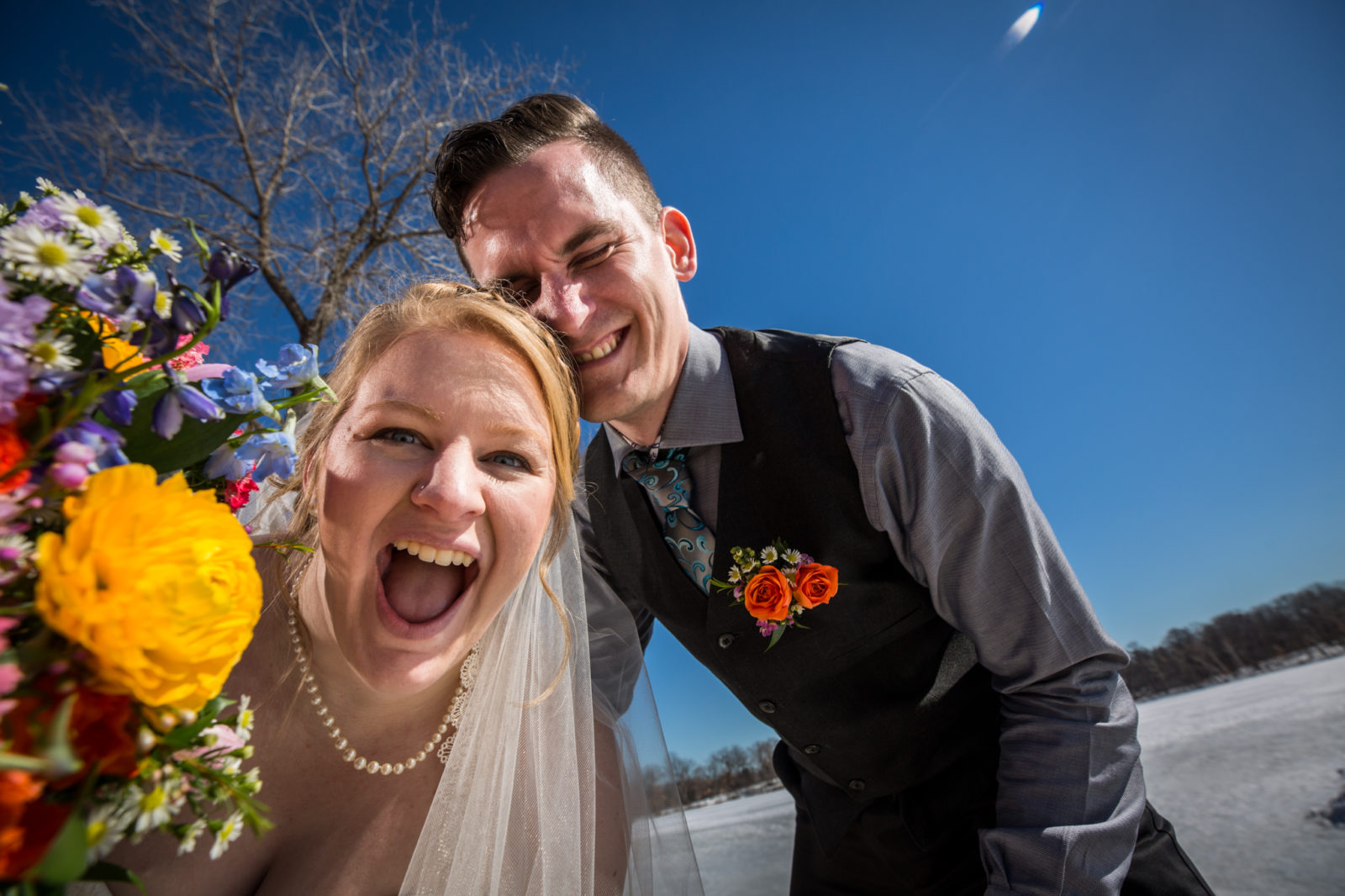 Mounds View wedding excited couple with flowers