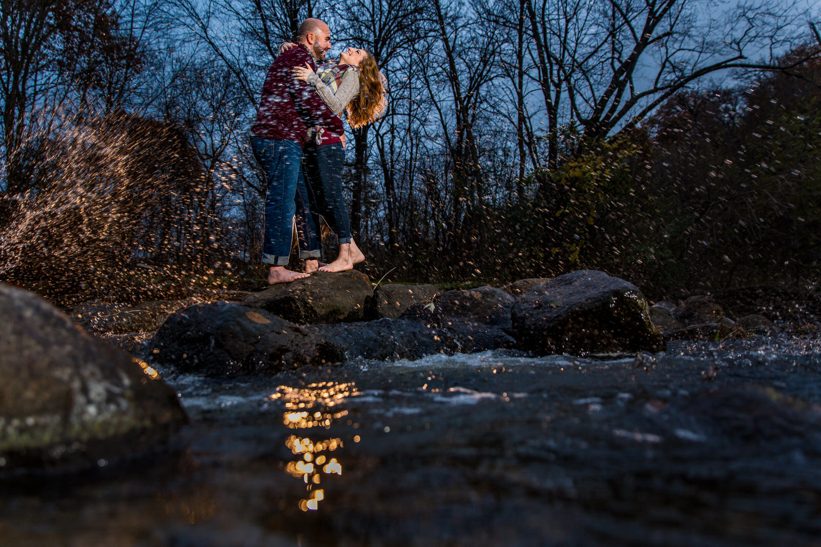 Wildwood Park Engagement Session couple playing in the water