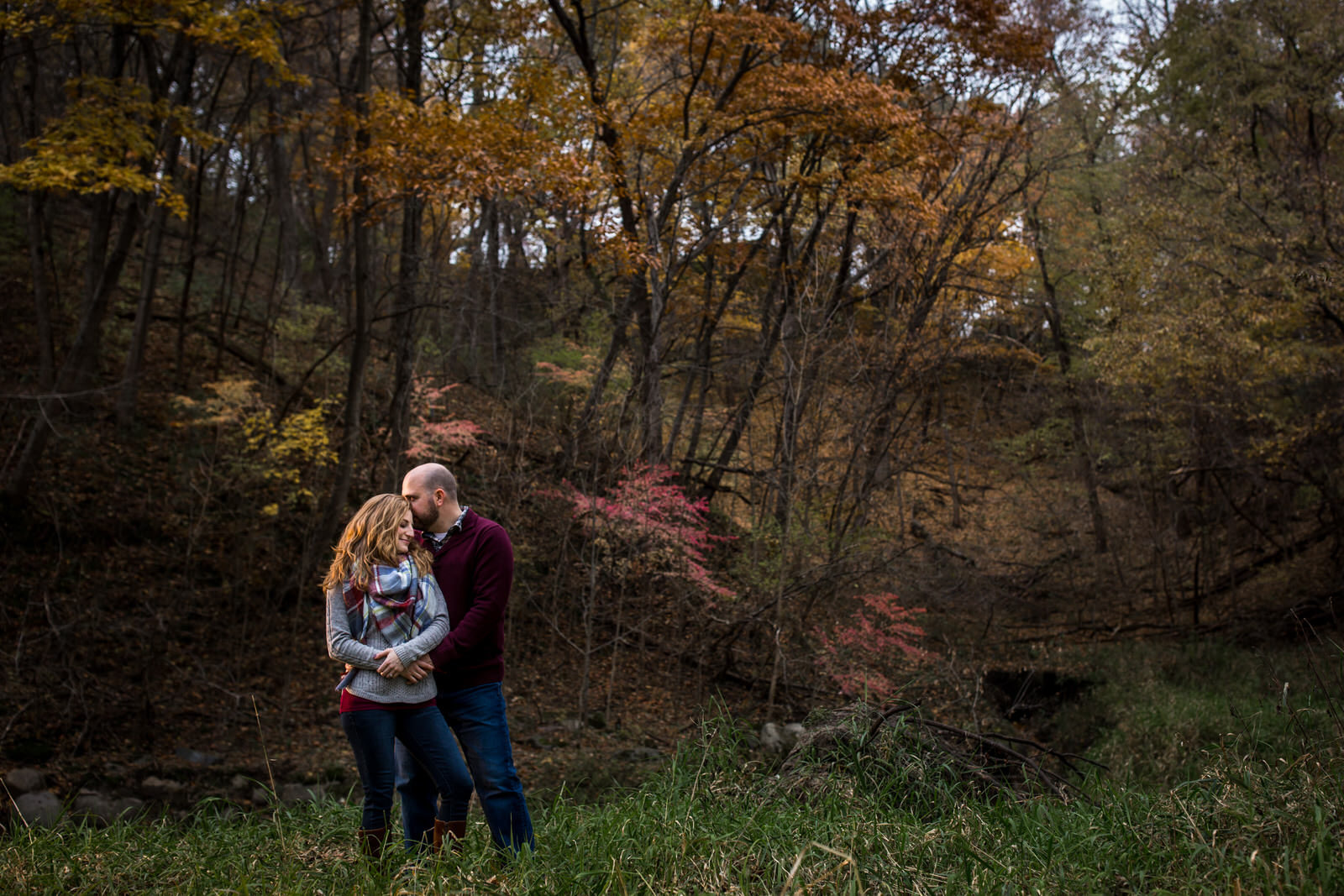 Wildwood Park Engagement Session couple in the fall leaves