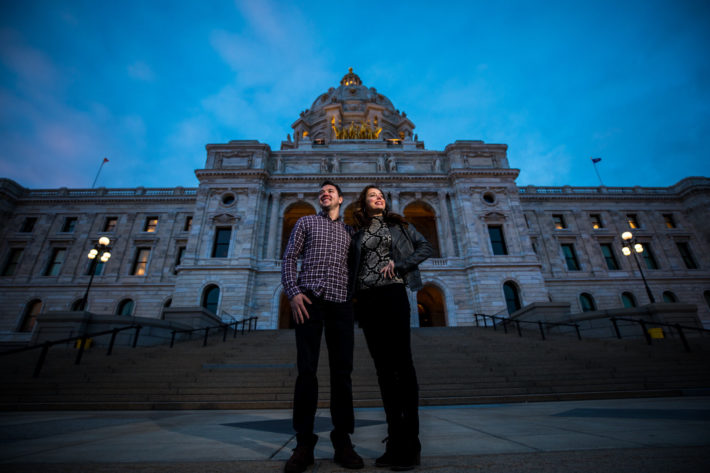Stillwater Engagement Session heroic couple in front of historic building