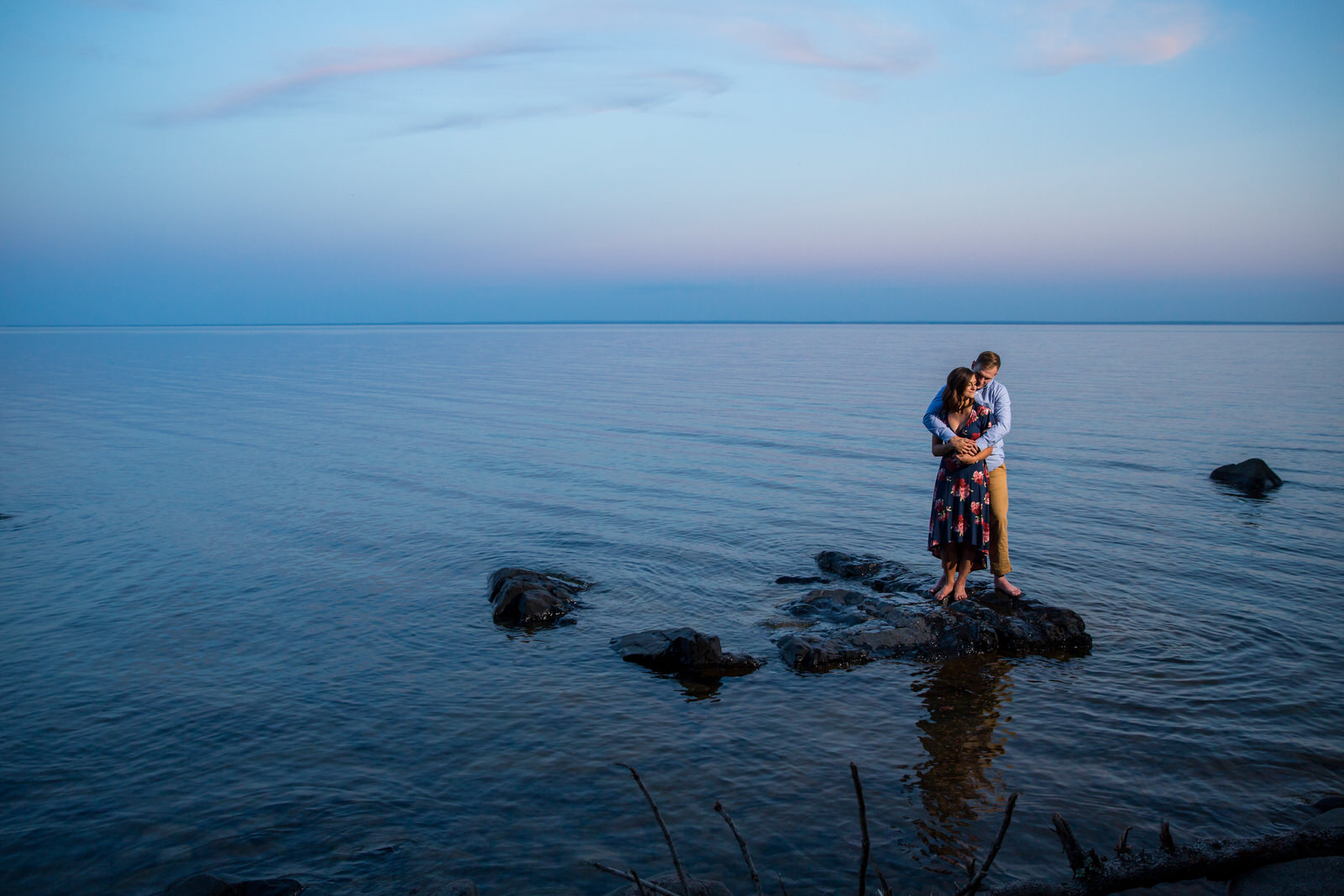 Duluth Summer Engagement Session romantic portrait in Lake Superior