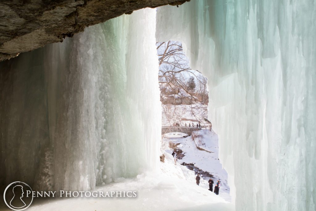Minnehaha Frozen Falls Adventure window through a curtain of frozen water