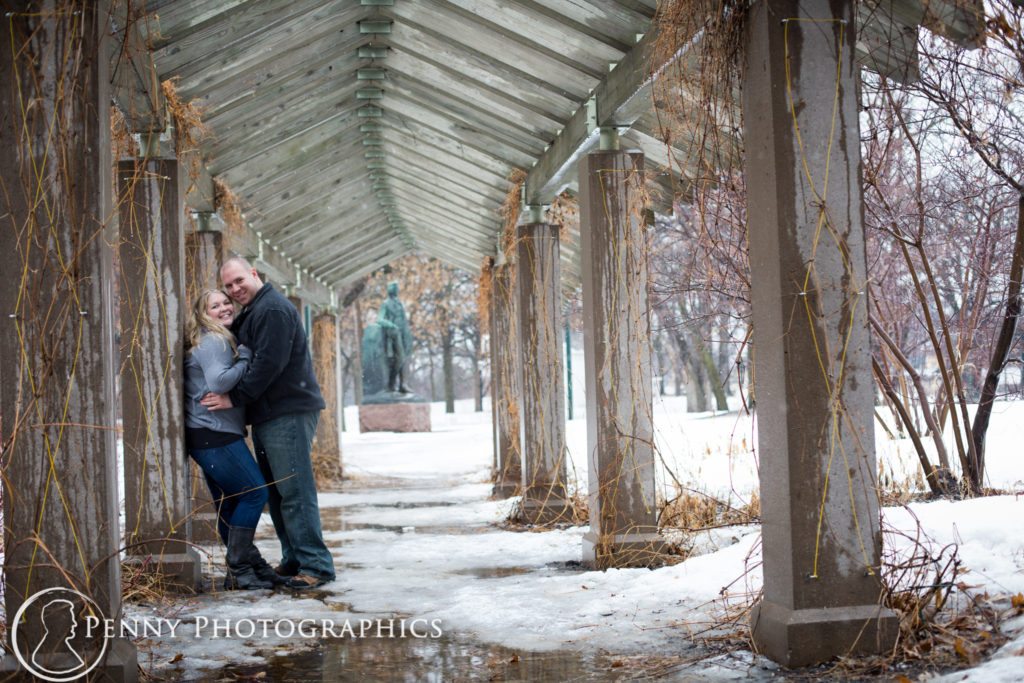 Frozen Falls Engagement couple in a timber pavilion