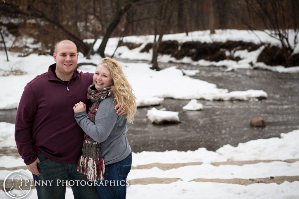 Frozen Falls Engagement couple by a frozen lake