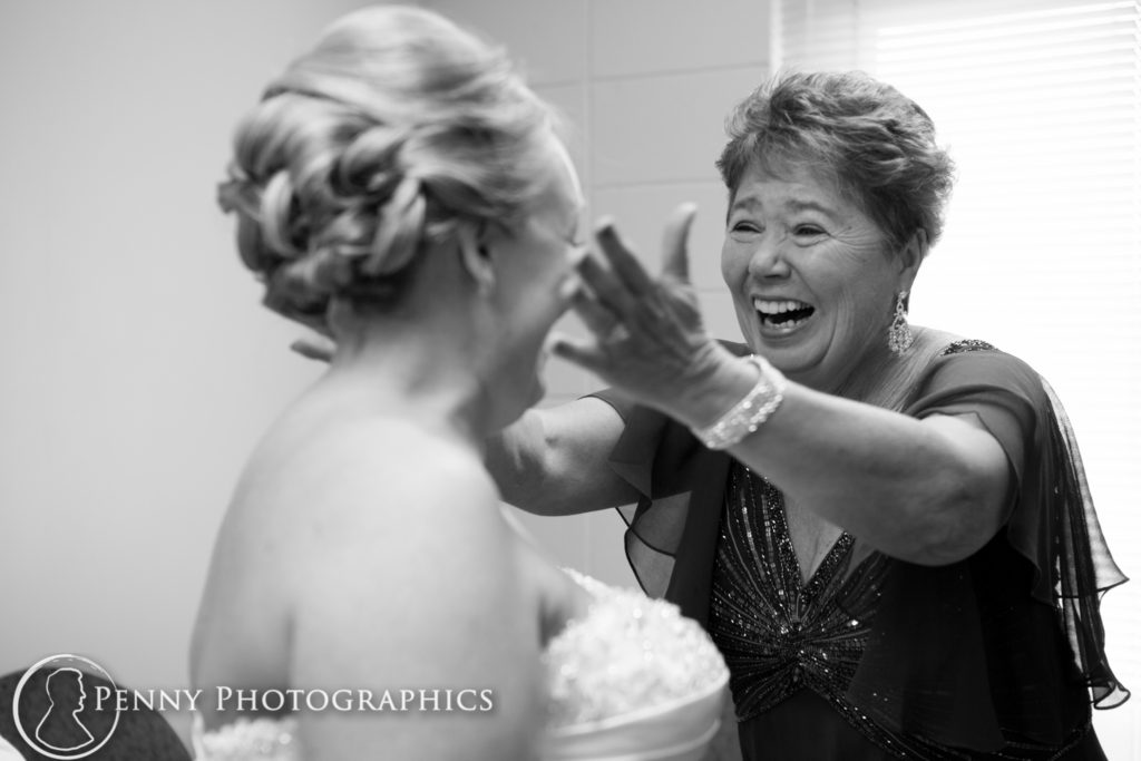 Earle Brown Center Wedding mom sees bride before wedding