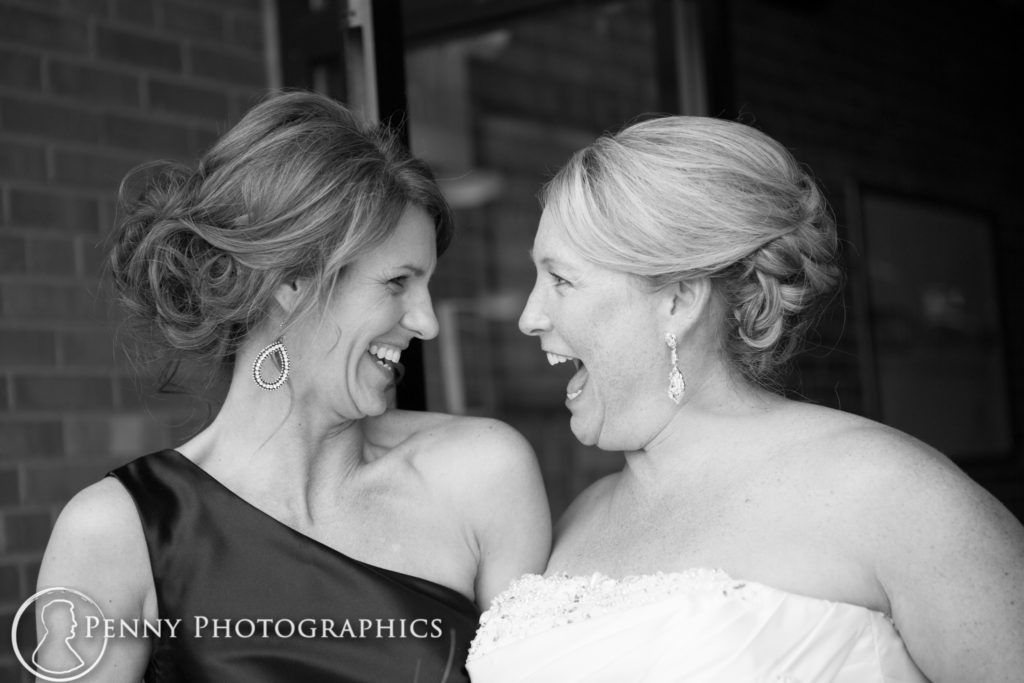 Earle Brown Center Wedding bride and best friend laughing 