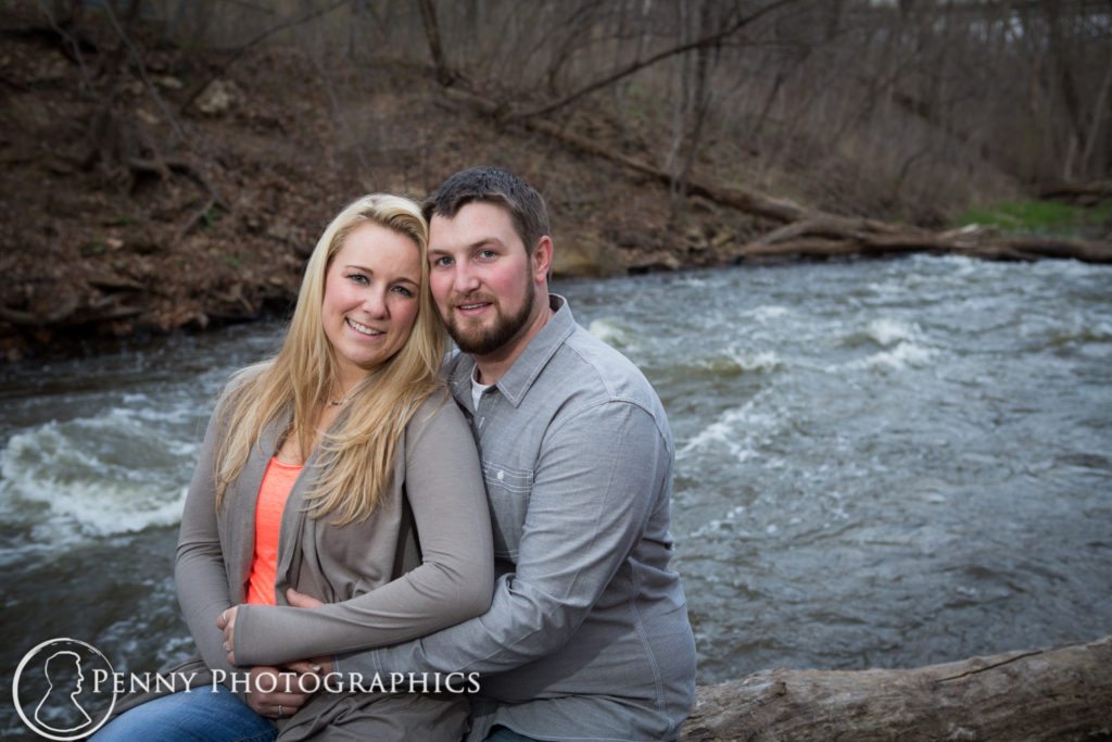 Colorful Cave Engagement couple by the riverbank