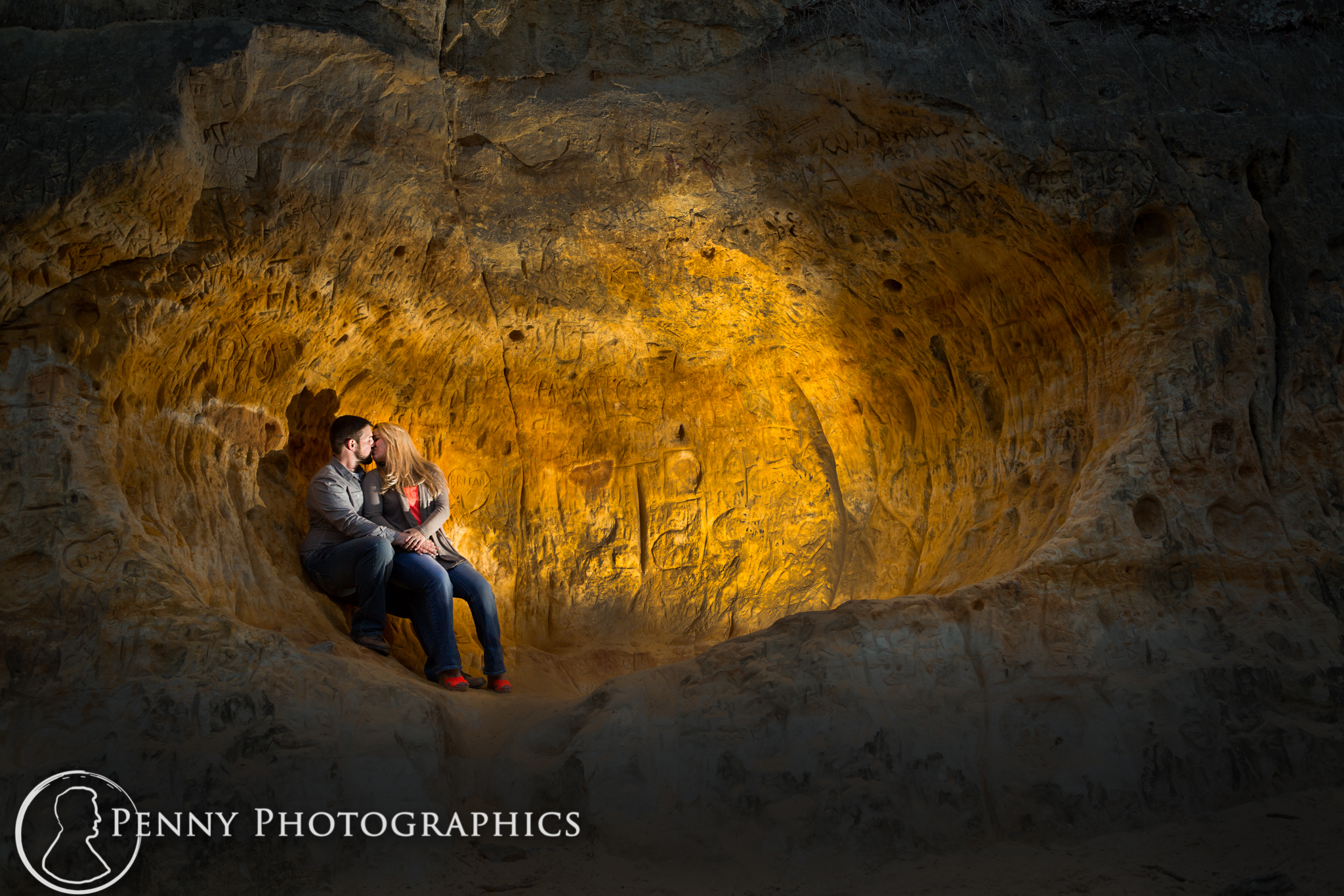 Couple inside a cave in Minnehaha falls park MN