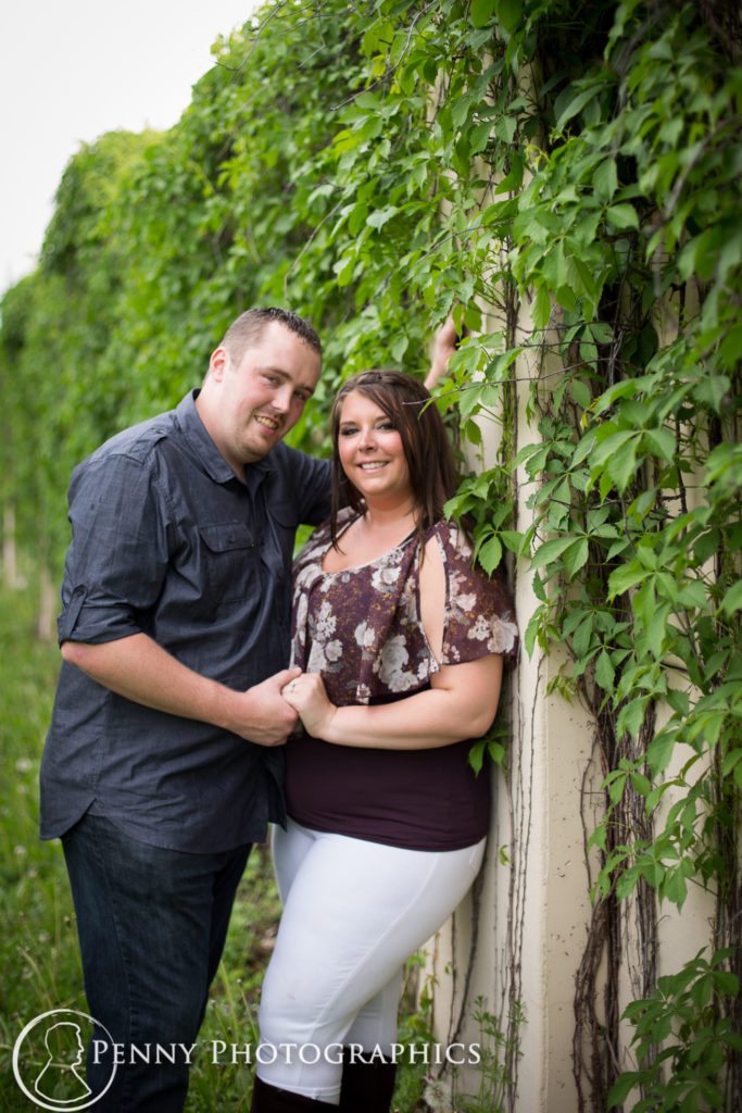 Outdoor Minnehaha Engagement couple in the ivy