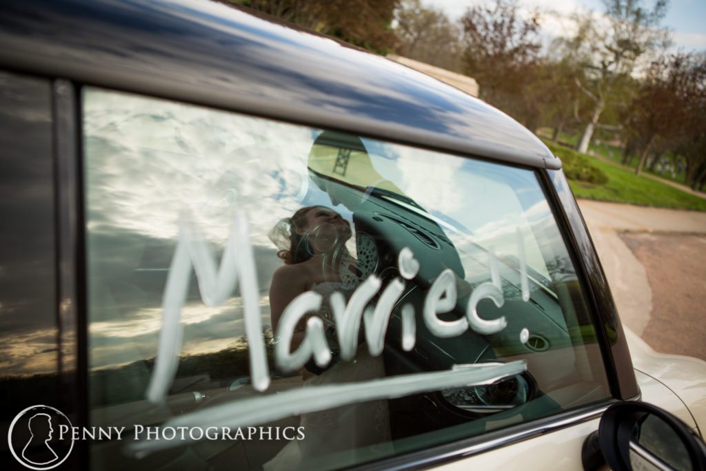 beautiful portrait of bride and groom in reflection
