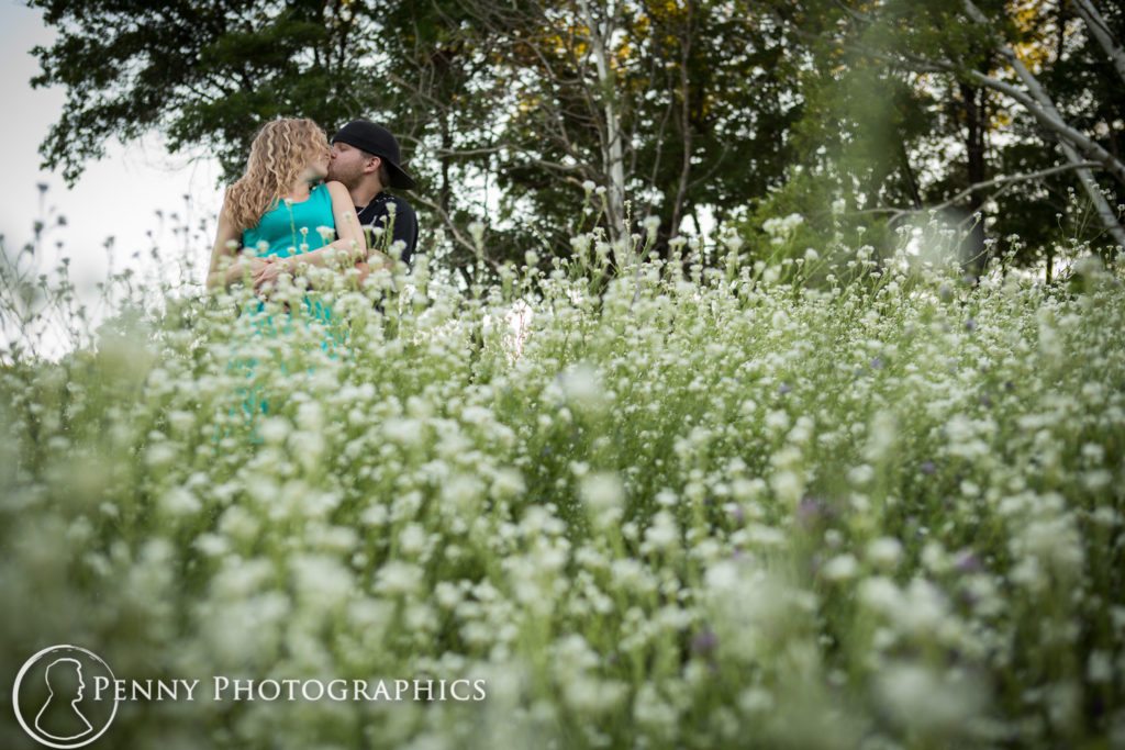 Silverwood Park Sunset Engagement couple in the wildflowers