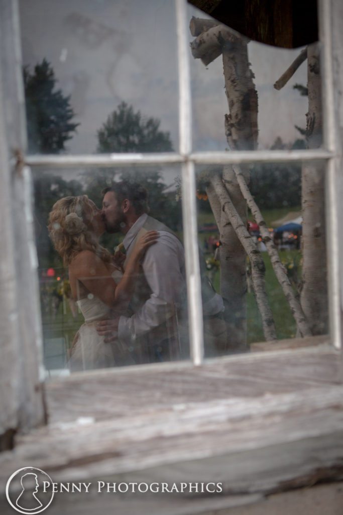 Outdoor Barn Wedding couple window portrait