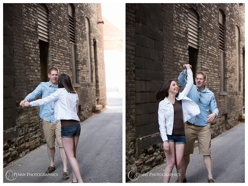 Downtown St. Paul Engagement couple dance in alley
