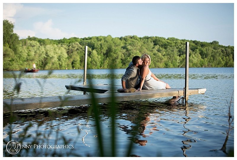 Lake Ann Engagement couple on the dock