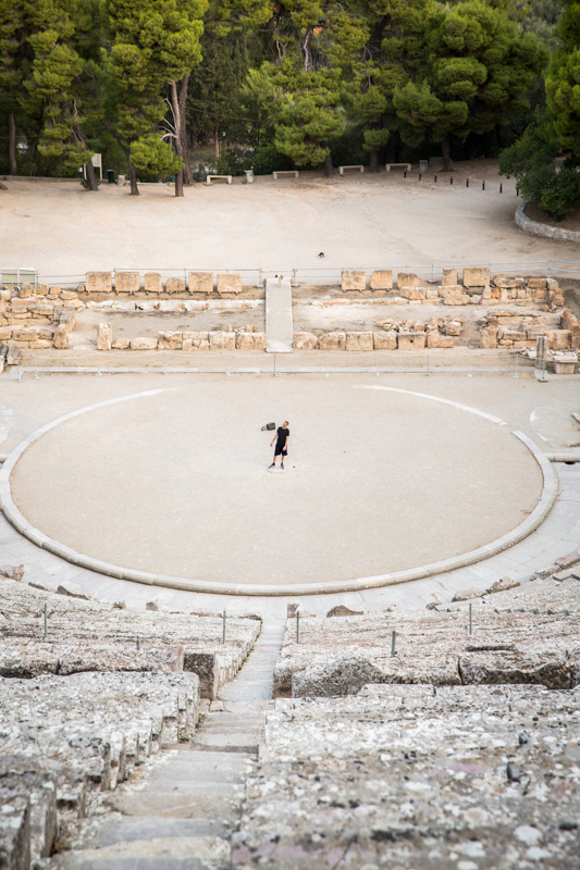 Epidavros man standing in ruins