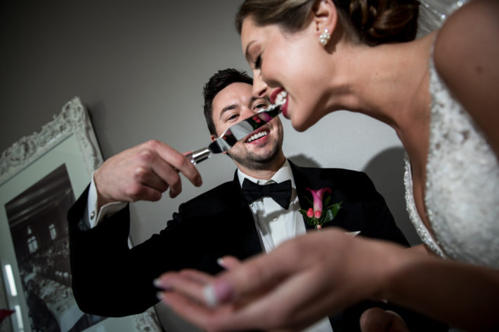 Calhoun Beach Club Wedding sharing cake
