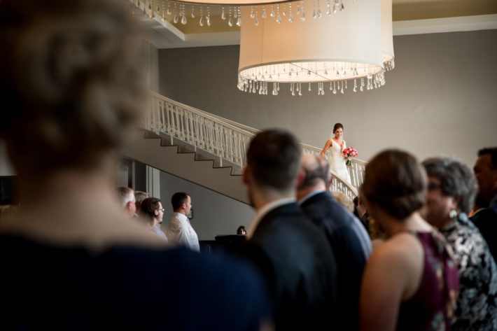 Calhoun Beach Club Wedding bride coming down grand staircase