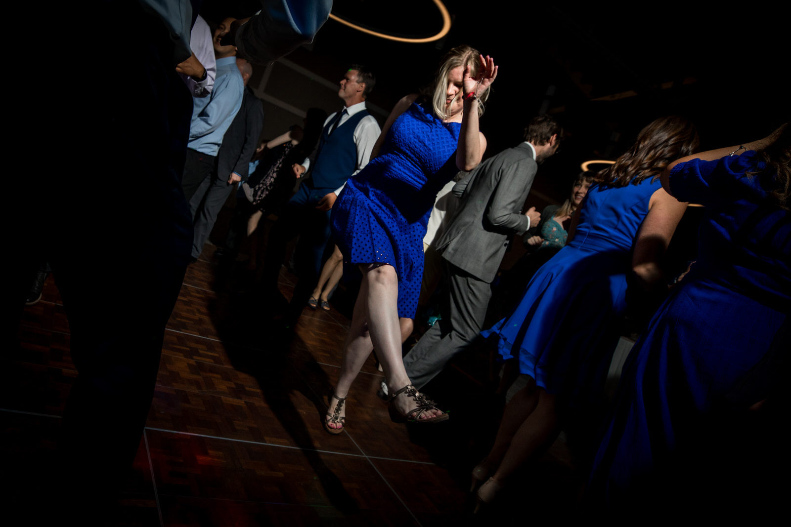 Earle Brown Wedding guest in a blue dress dancing