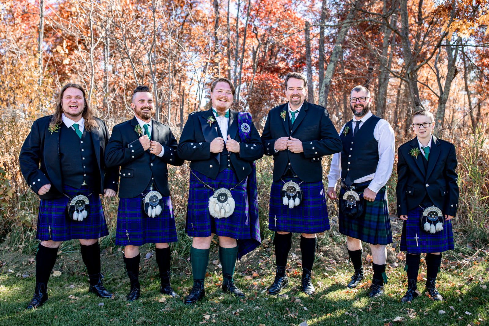 the guys in their kilts The Woods Wedding
