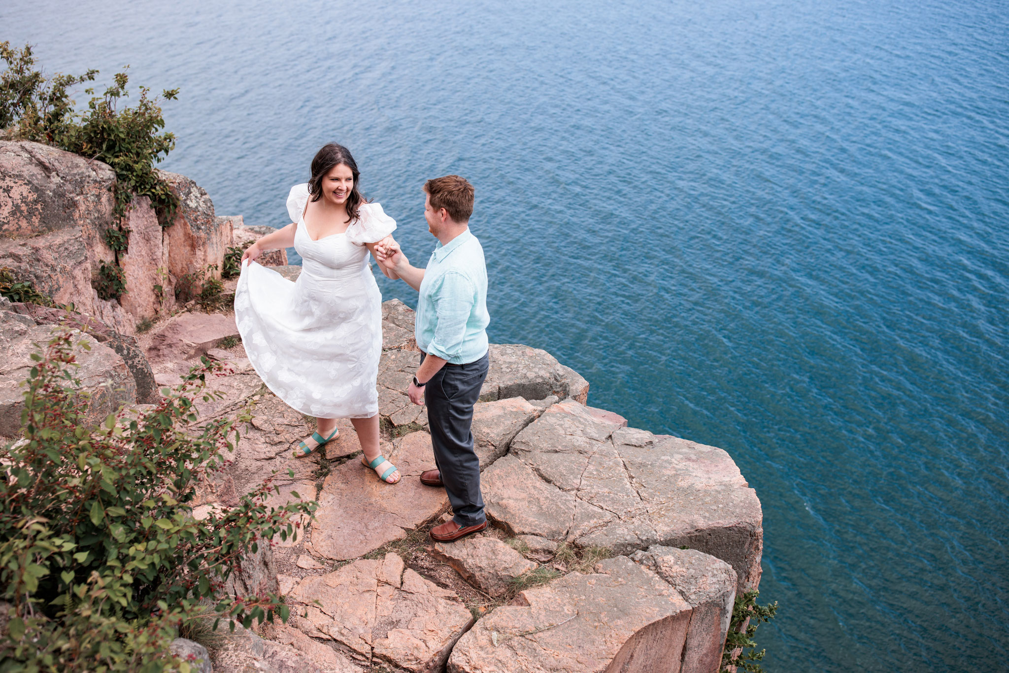 Couple dancing on cliffside of Palisade head, MN.