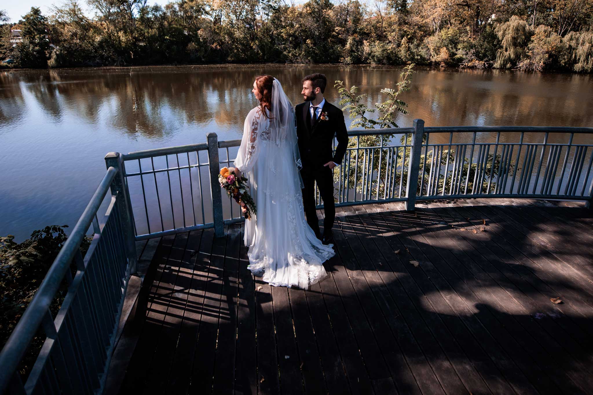 Ariel view of Bride and groom looking at the Rum river Minnesota.  