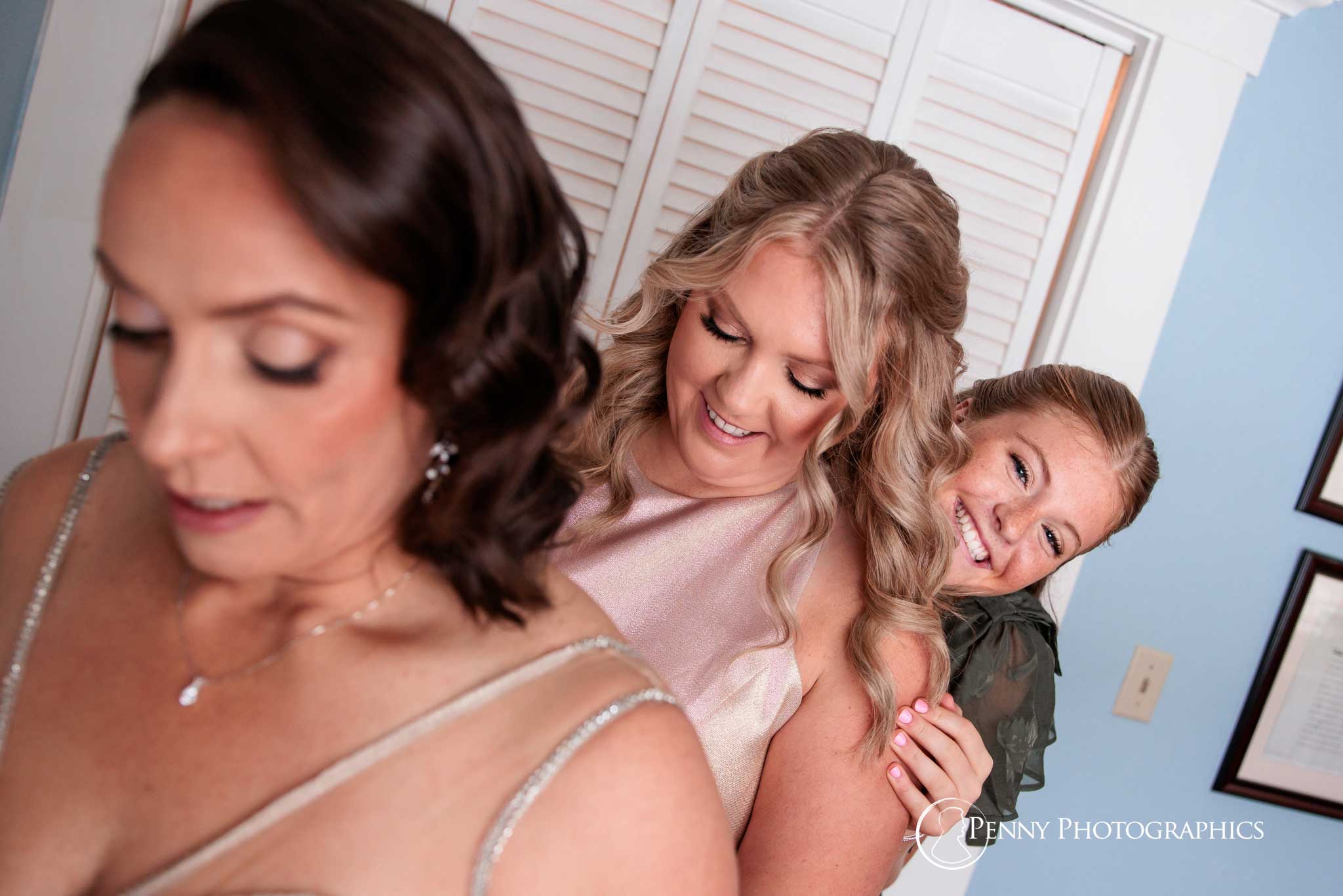 A row of girls getting ready for a wedding.