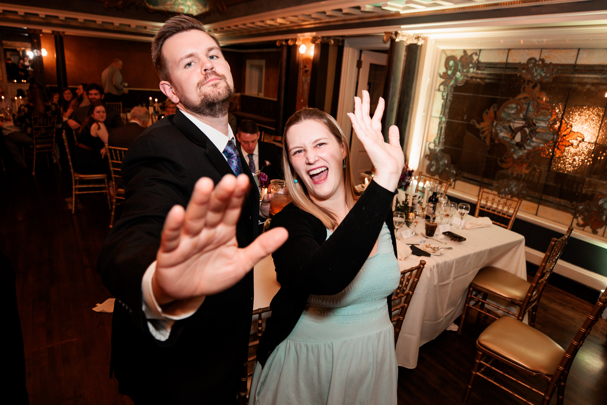 Wedding guests being silly at the reception at Semple mansion.